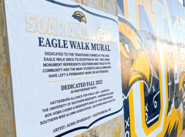 Eagle Walk mural USM sign